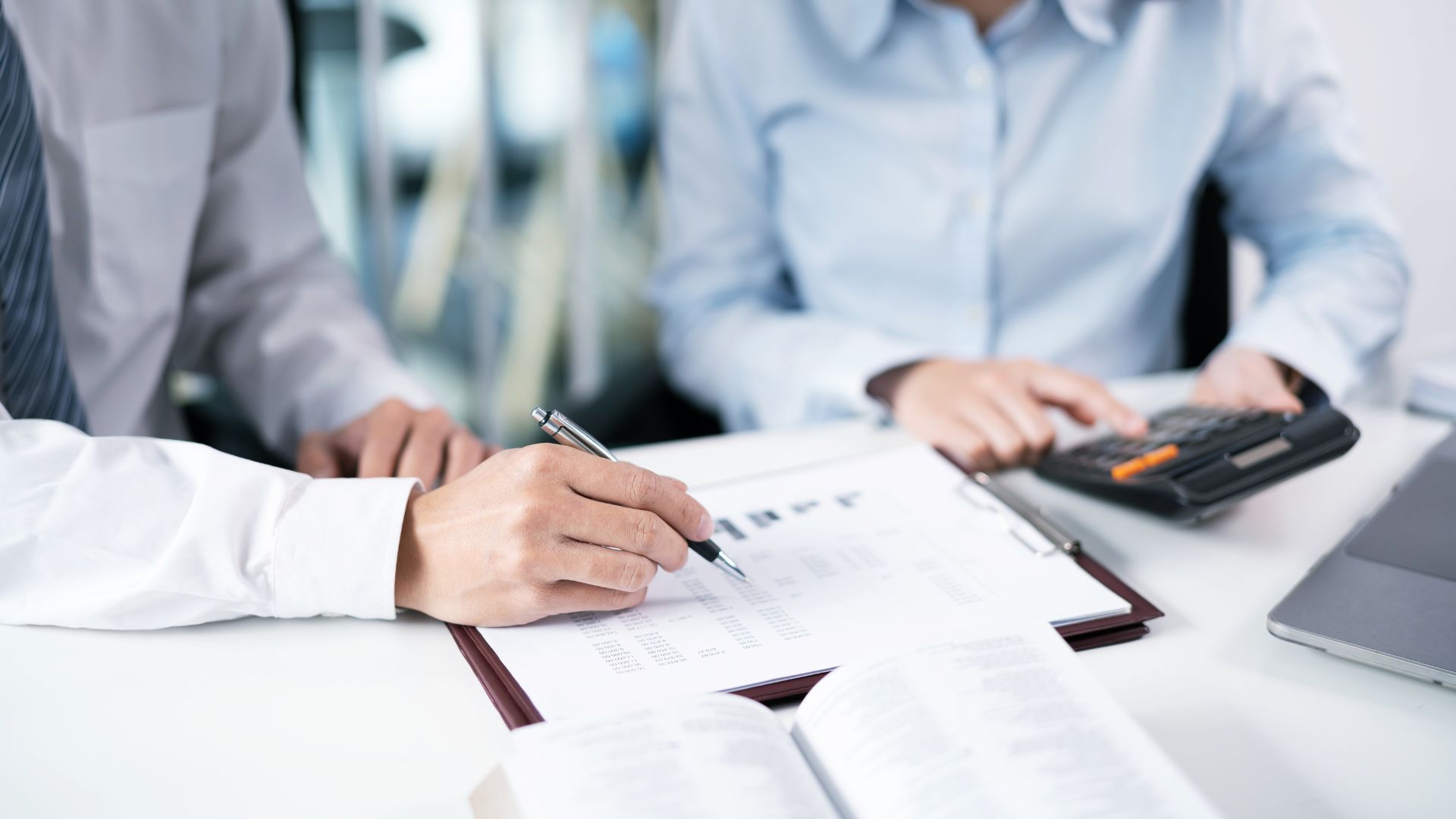 Business owner reviewing private lending options with mortgage planner